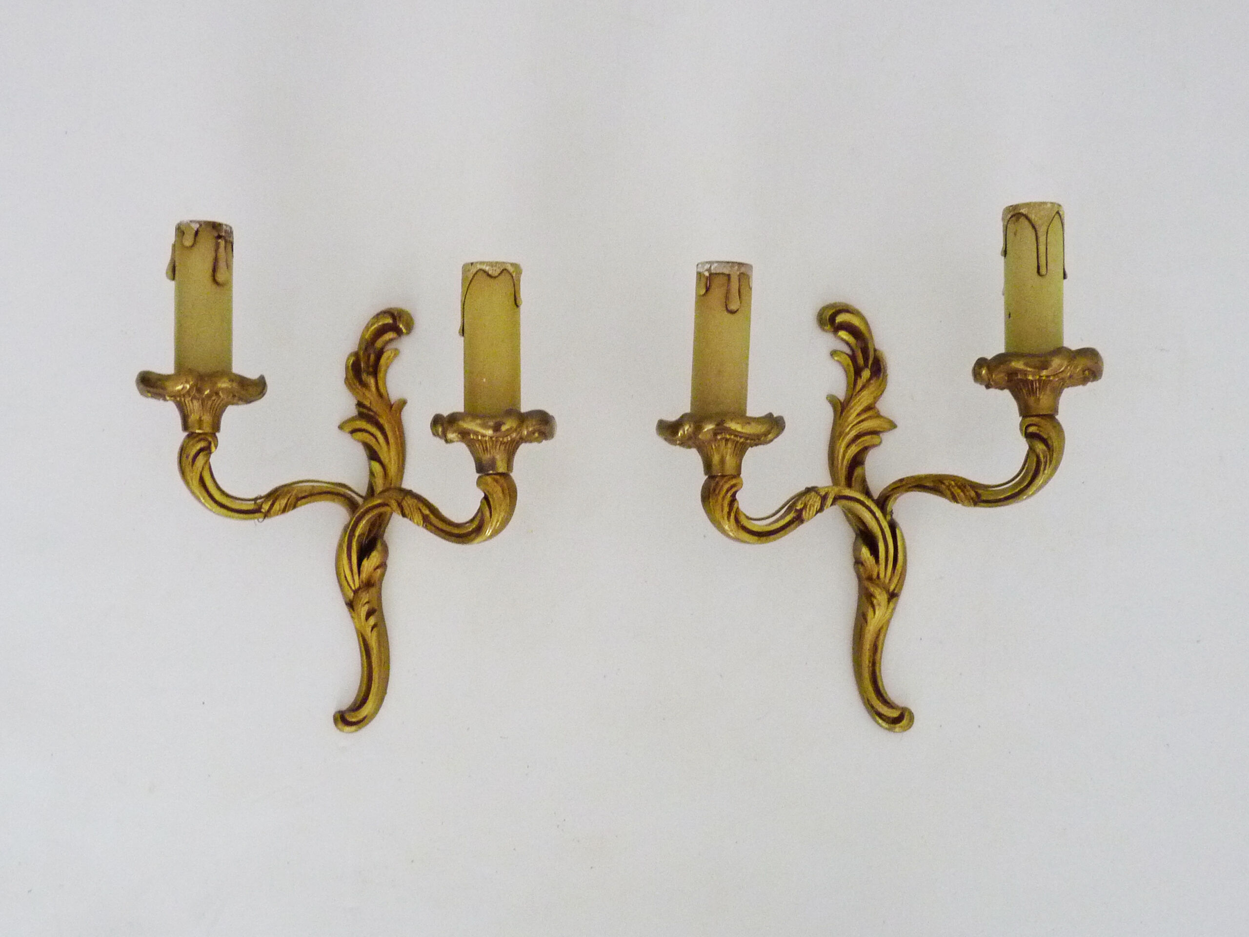Old pair of double wall sconces in bronze.
