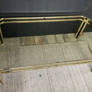 Vintage 1970s coffee table in gold metal and smoked glass.