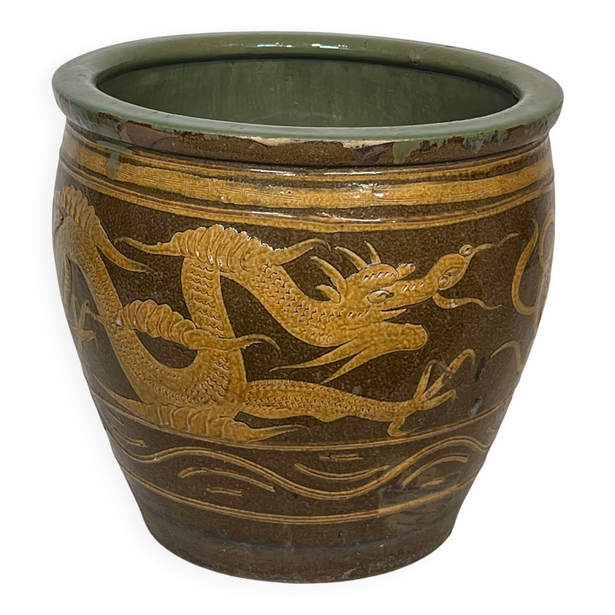 Importante jardinière chinoise en terre-cuite vernissée à décors de dragons