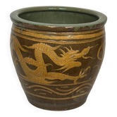 Important Chinese glazed terracotta planter decorated with dragons.