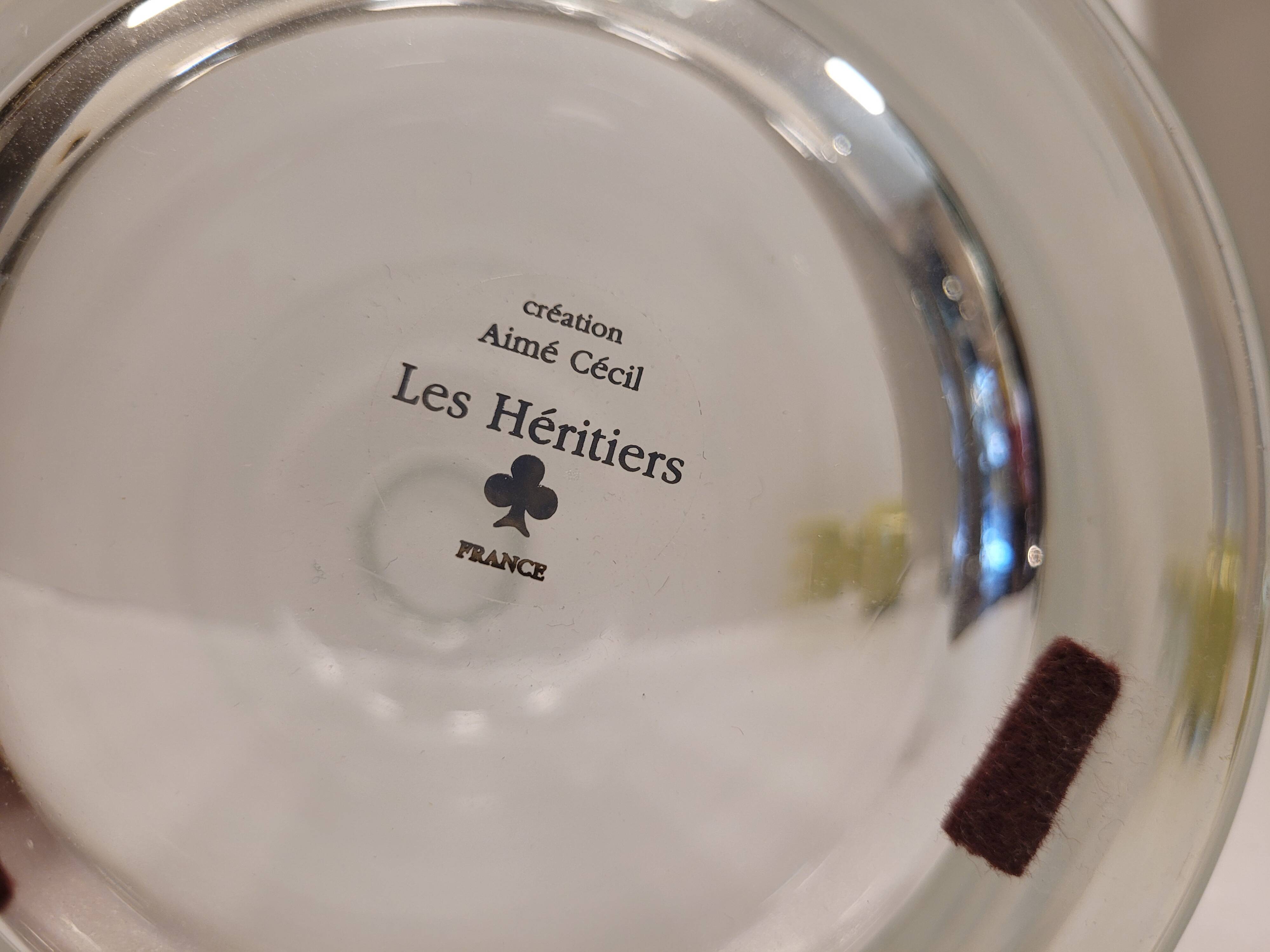 pair of decanters, bottles or jars, made in crystal with a ceramic tap enameled in green color