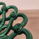 Antique woven fruit bowl in green Vallauris earthenware.