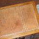 Vintage walnut desk with a leather top and two drawers.
