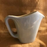 Light blue pitcher in vintage earthenware