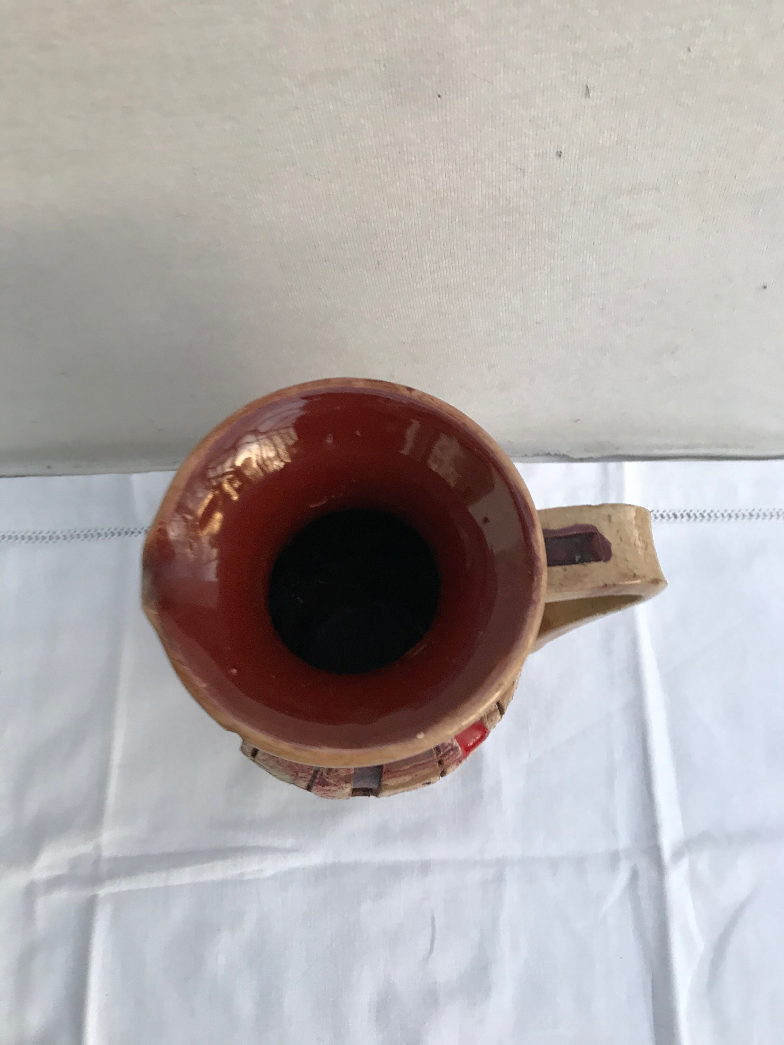 Former beige ceramic pitcher