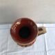 Former beige ceramic pitcher