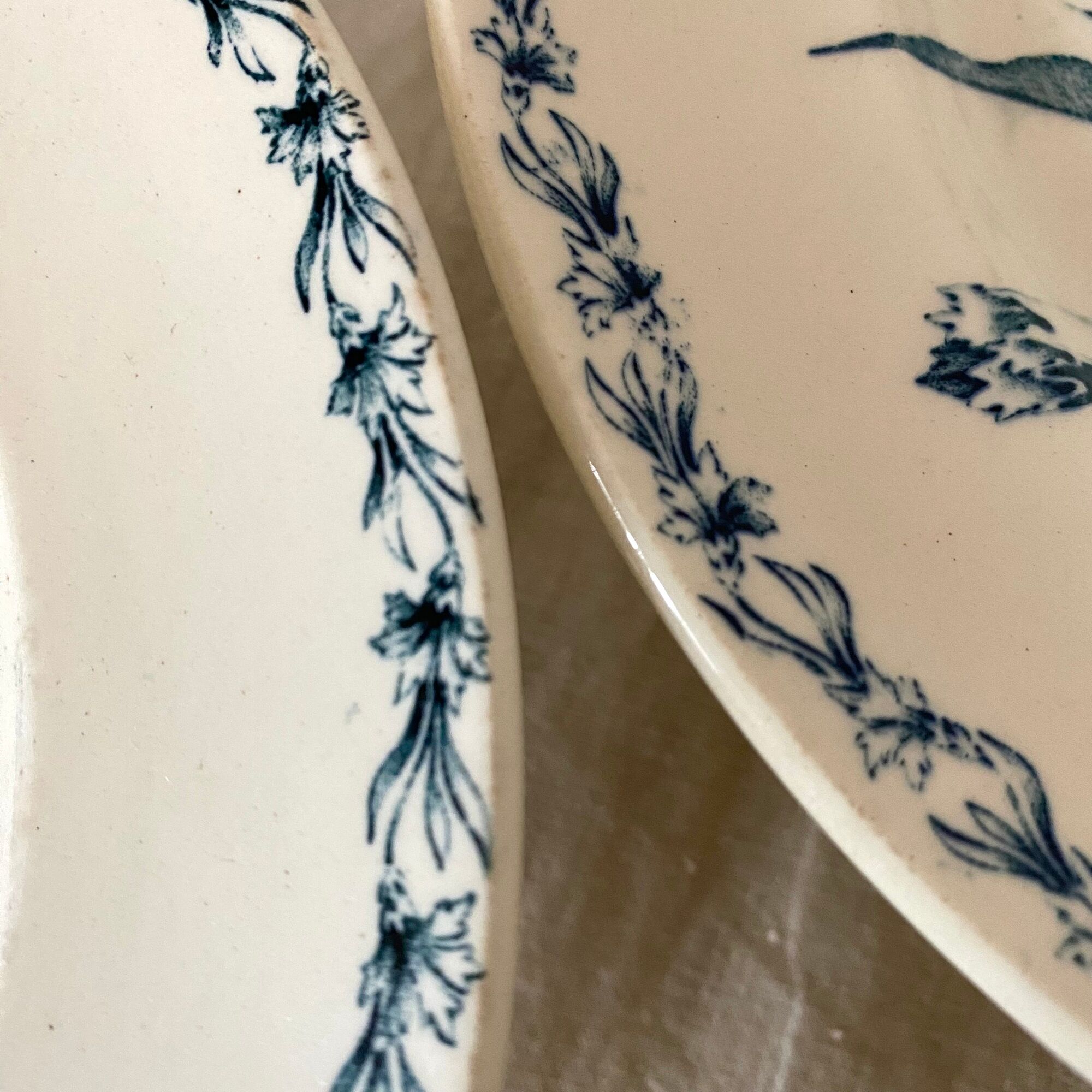 Antique dishes on foot in Luneville carnation porcelain
