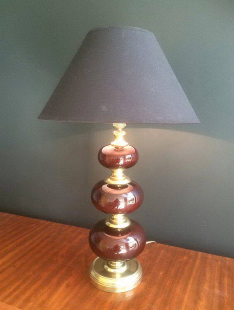 Lamp made of brass and red colored glass