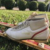 Vintage Esko Järvinen skis with shoes on bindings