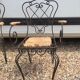 40 year old armchair pair in metal and straw