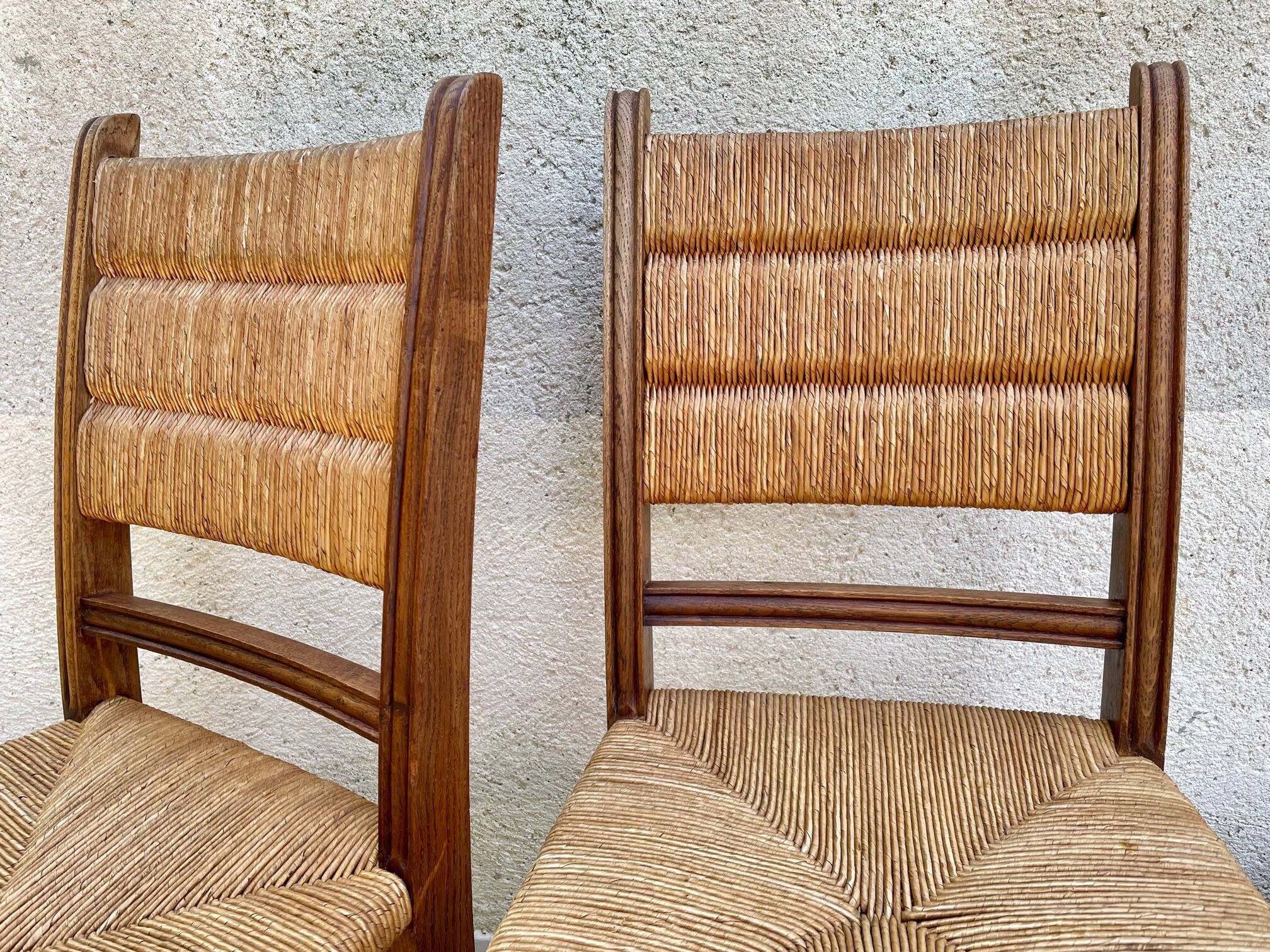 Pair of straw and solid oak chairs