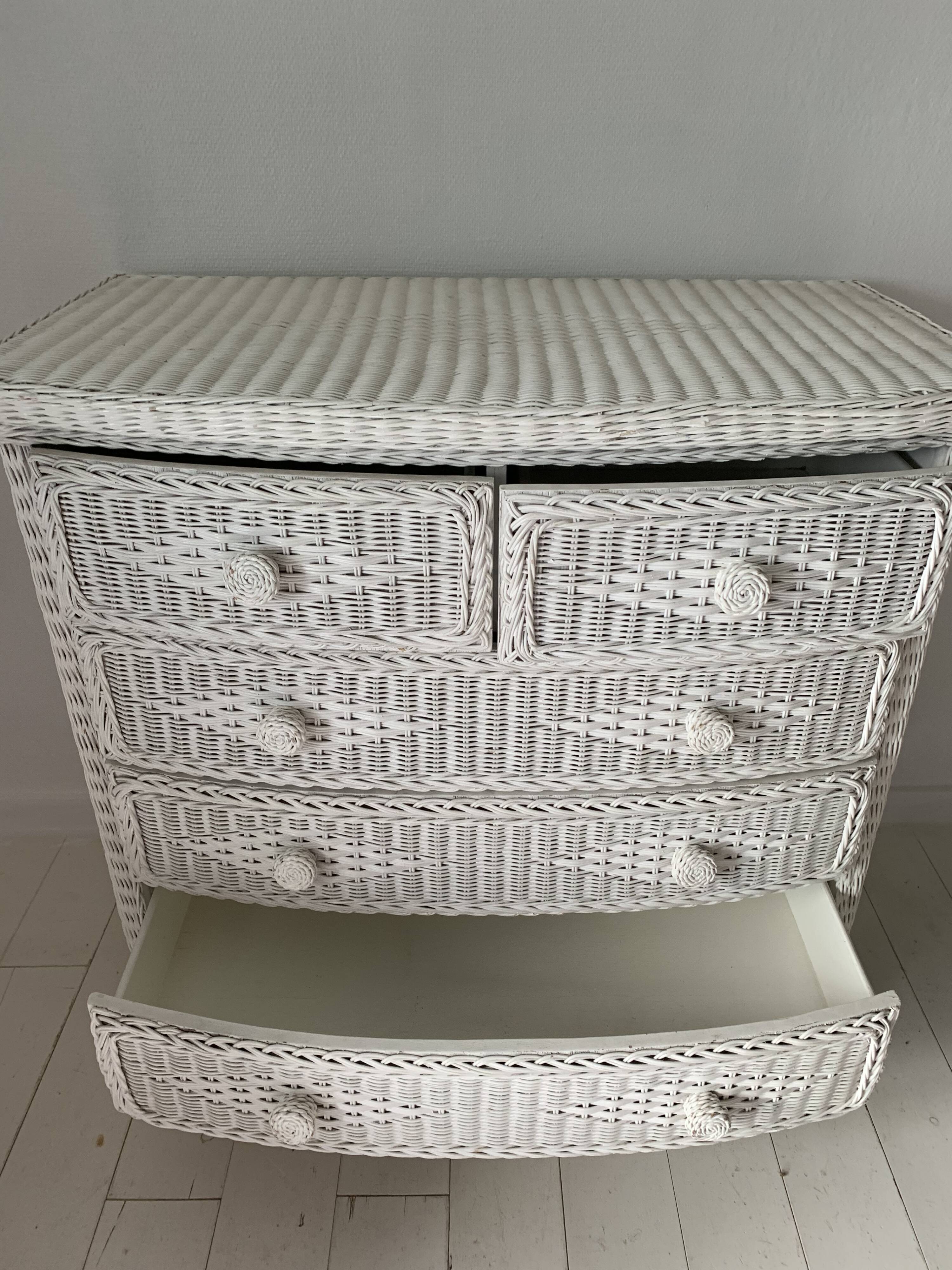 White dresser in vintage rattan