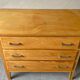 Vintage wooden chest of drawers from the 1950s
