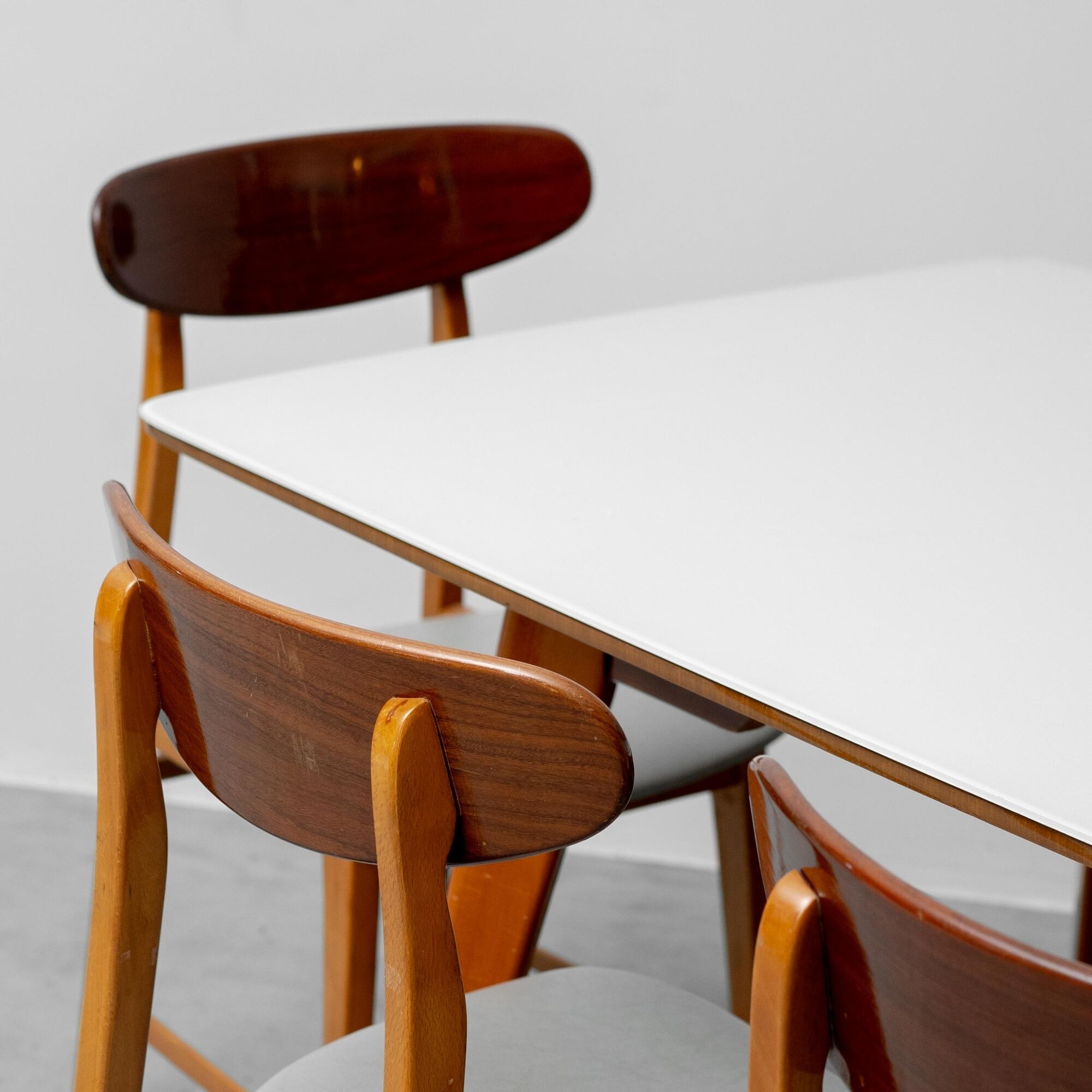 Vintage dining table set with 6 wooden chairs from the 1960s modernism