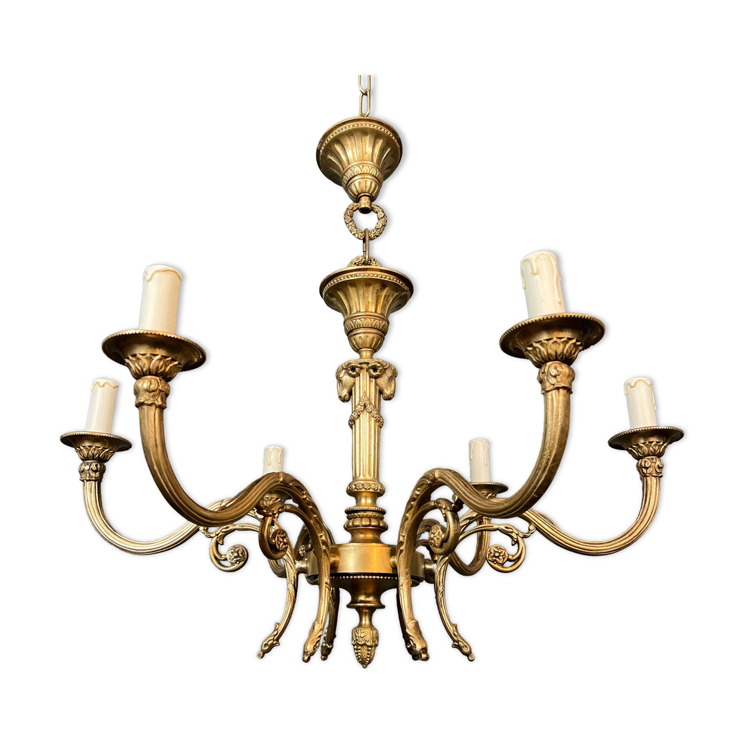 Bronze chandelier with ram's head motifs in the Louis XVI style, in the manner of Maison Jansen.