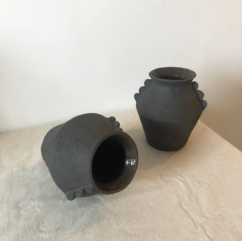 Black ear vase