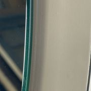 Vintage mirror with smoked glass frame from the 1970s.