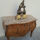 Commode style Louis XV en marqueterie et bois de rose