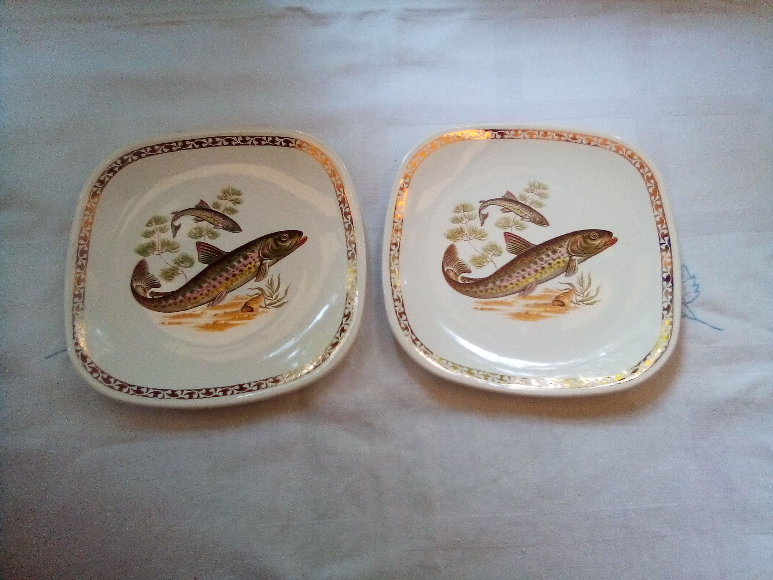 Set of 12 Longchamp plates and fish dish