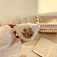 Vintage white porcelain sugar bowl and cottage core floral pattern