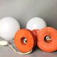 Pair orange painted wood opaline glass tabel lamps