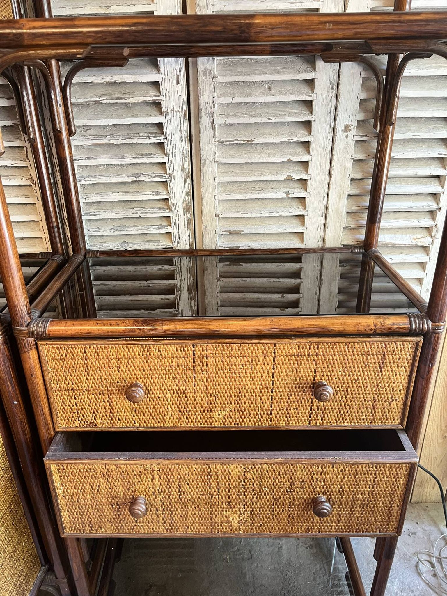 Vintage rattan shelving unit