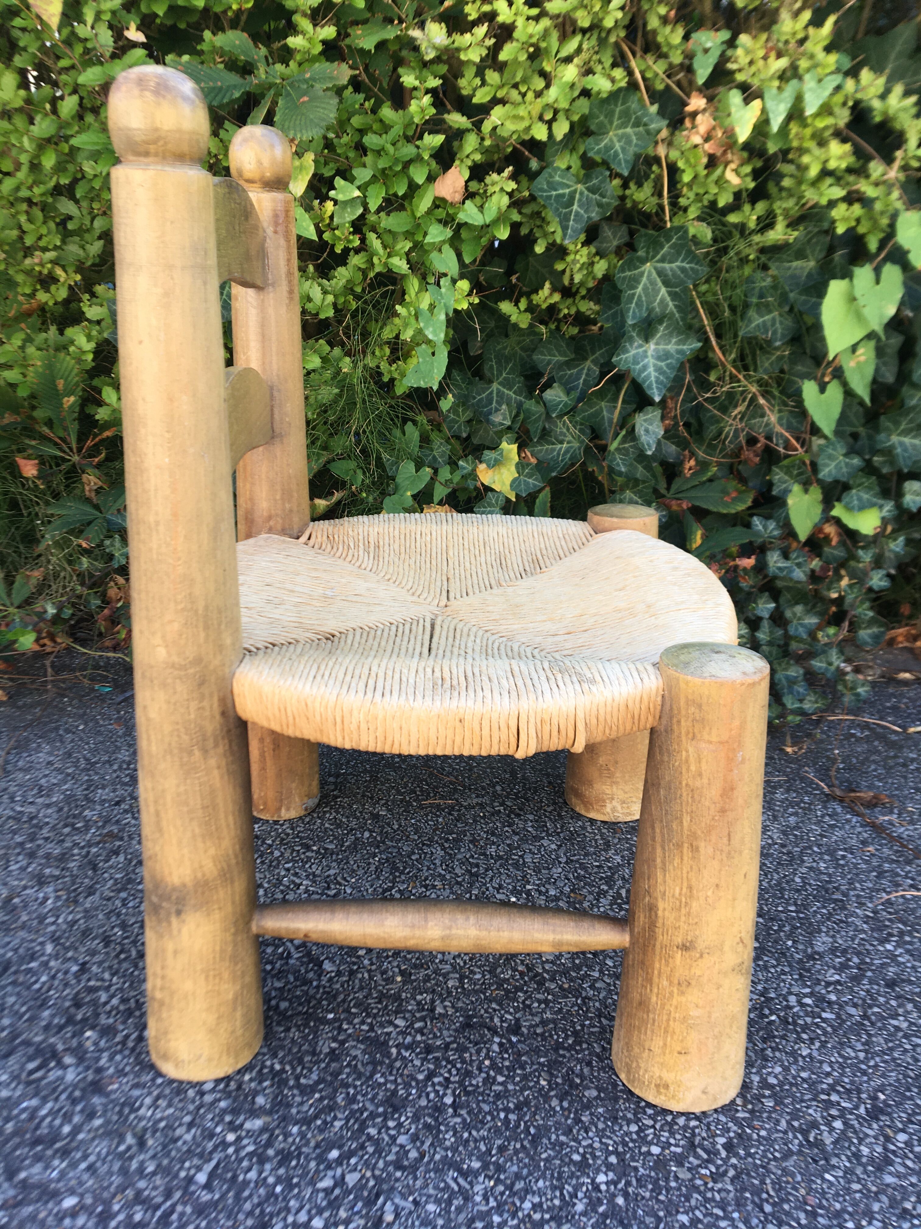 Low wooden chair and straw 50s