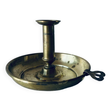 Antique brass candle holder