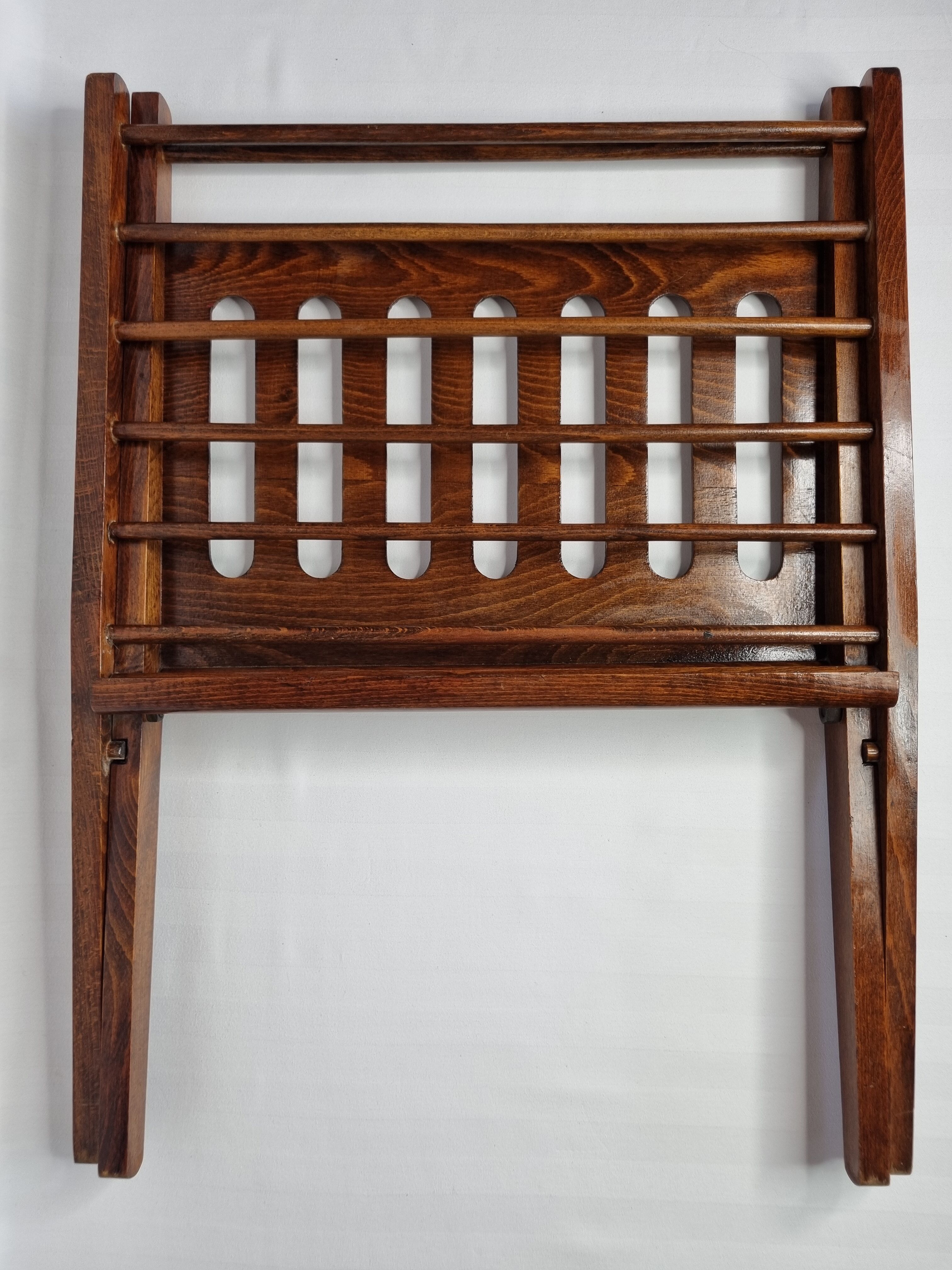 Folding teak magazine holder by Cees Braakman