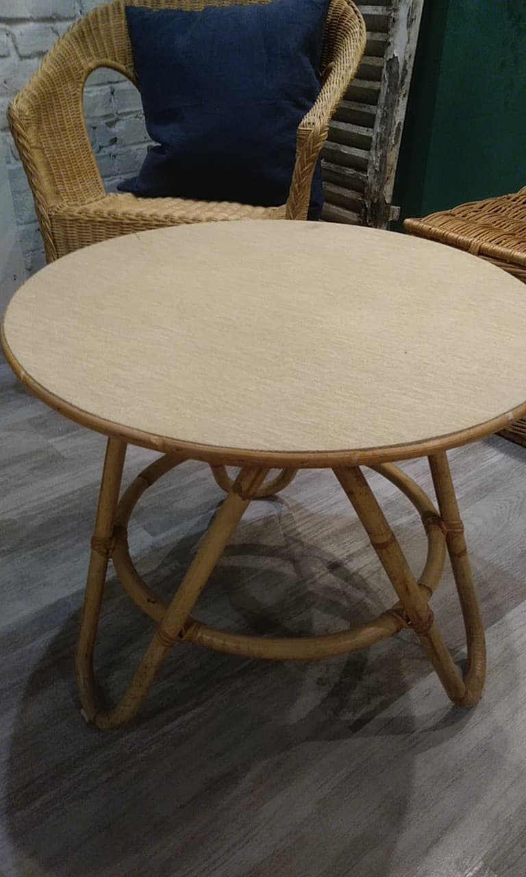 Round coffee table in old rattan