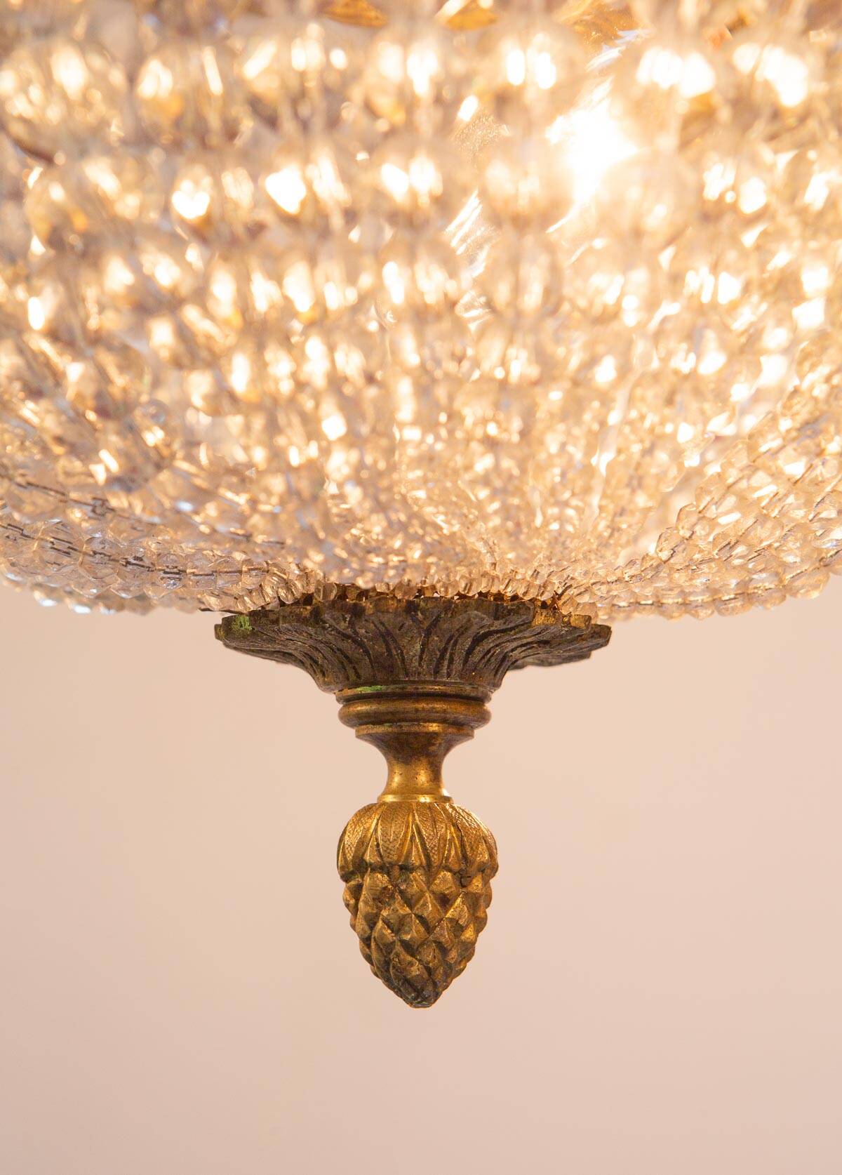 Old bronze ceiling light and 3 tulip flowers