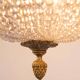 Old bronze ceiling light and 3 tulip flowers
