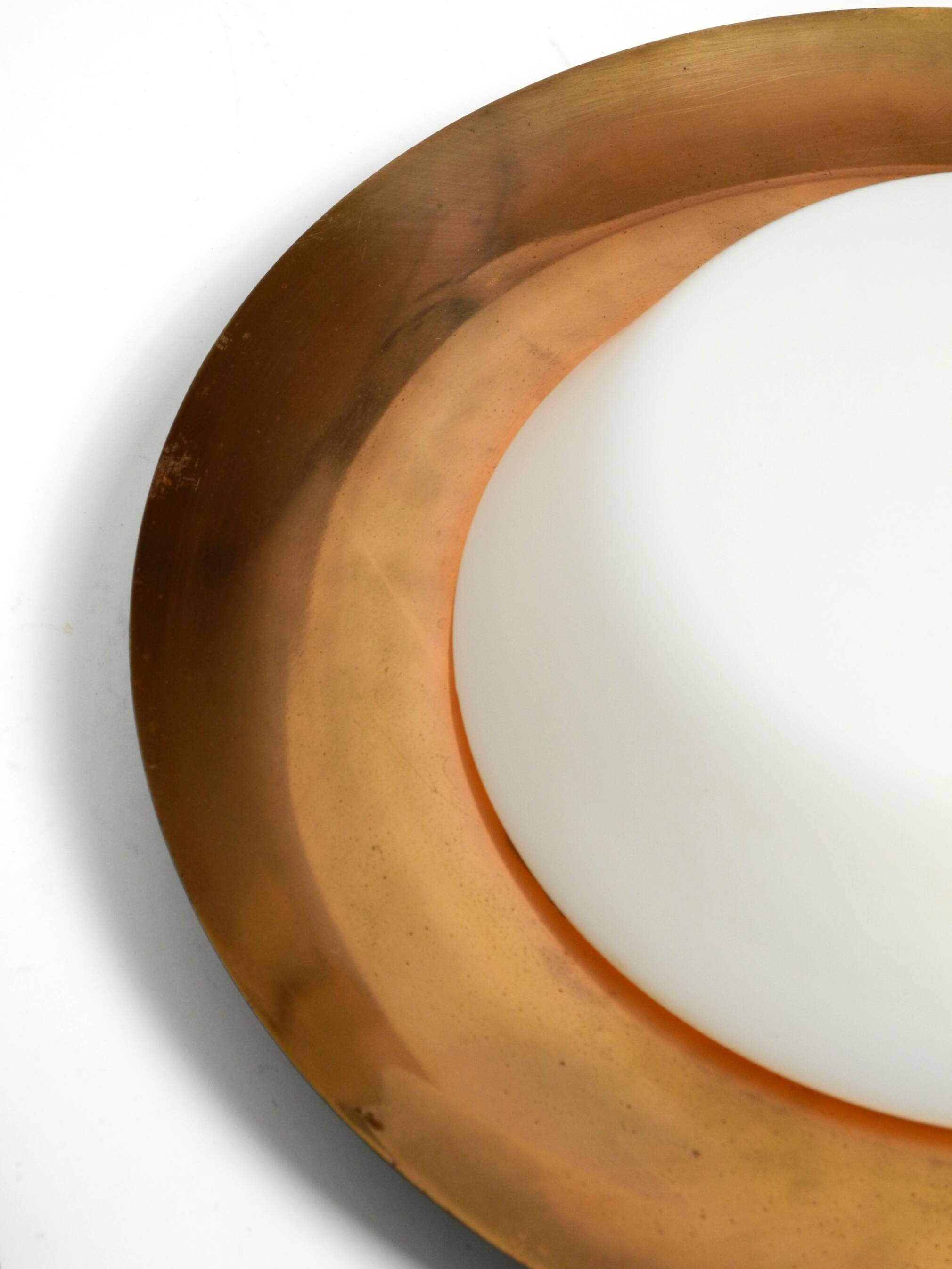 Pair of Mid Century wall or ceiling lamps made of glass with copper-plated