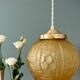 Suspension globe vintage art déco en verre dépoli jaune