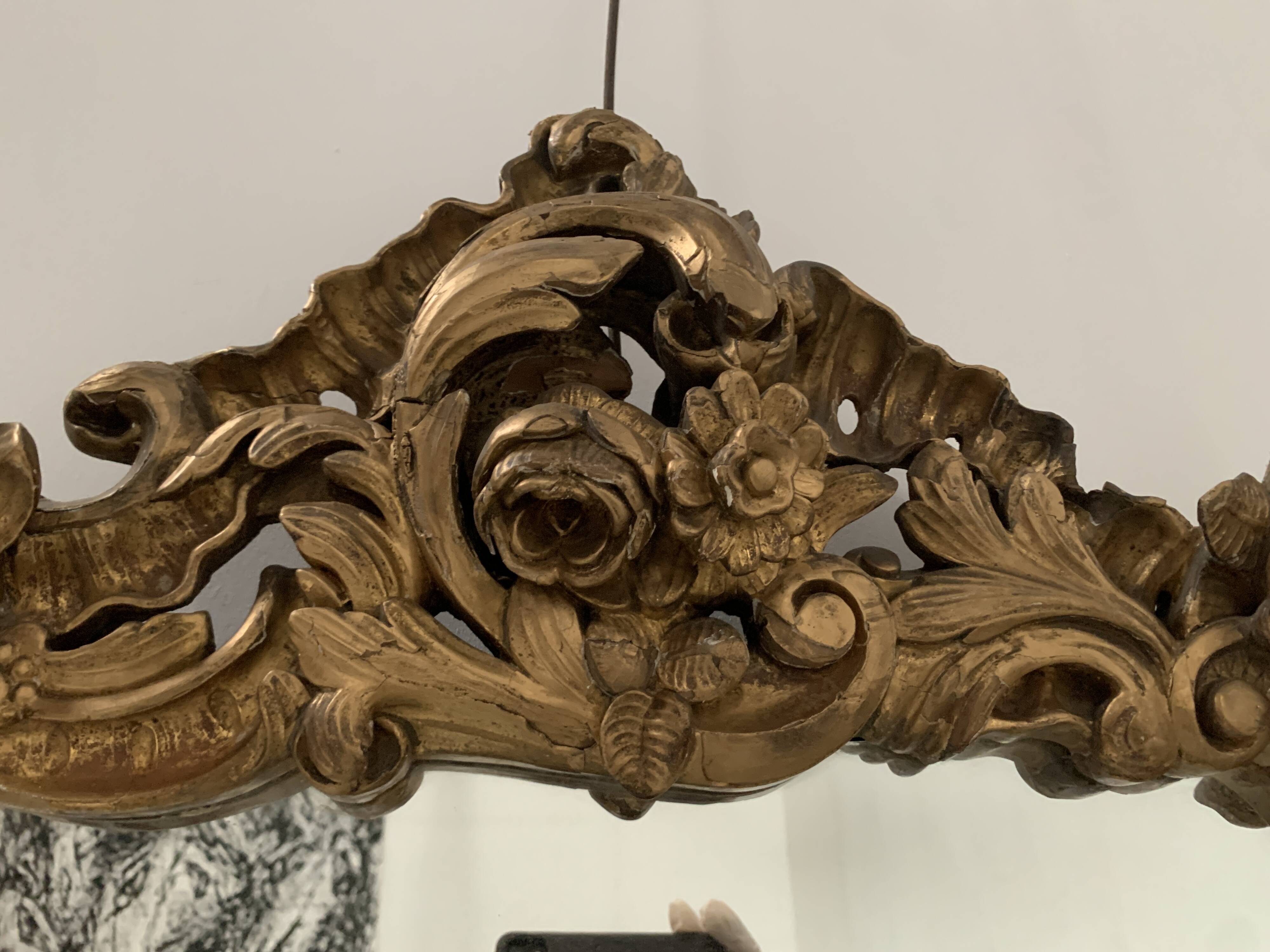 Louis XV mirror in carved gilded wood, late 18th century