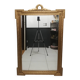 Carved wooden pediment mirror