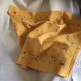 Yellow linen table centre