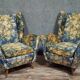 Pair of vintage armchairs with enveloping backrest.
