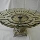 Large smoked glass fruit bowl with a metal base.