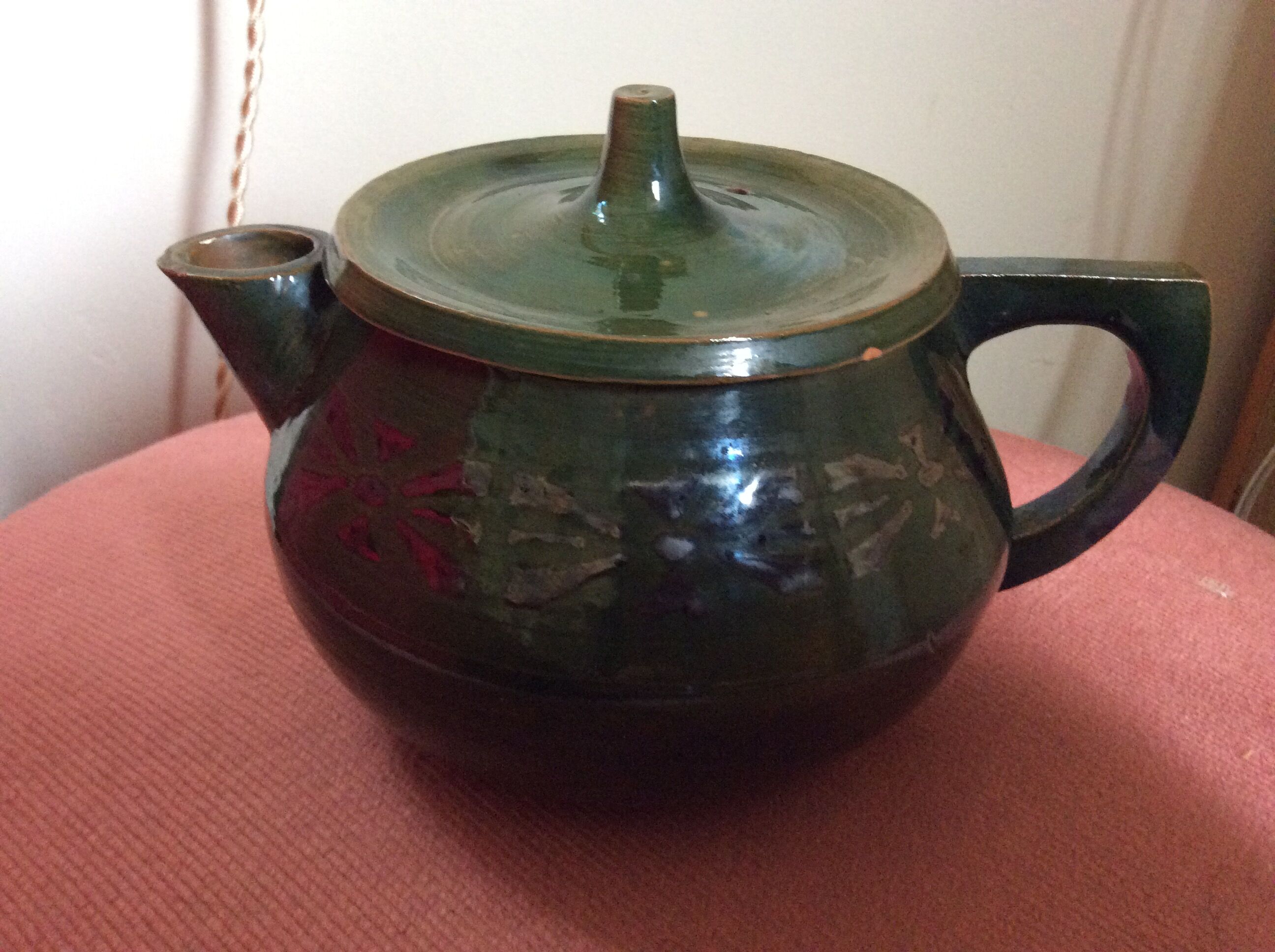 Glazed terracotta teapot
