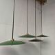 Suspensions in enamelled sheets