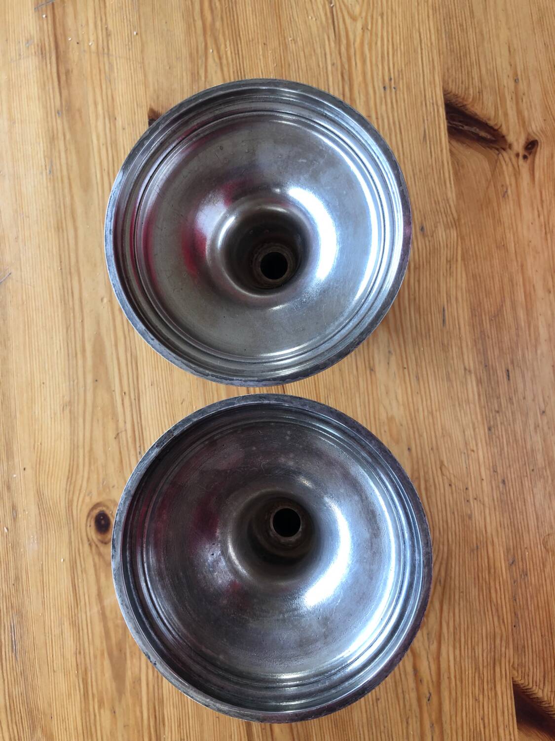 Silver candlesticks by TH HENRY