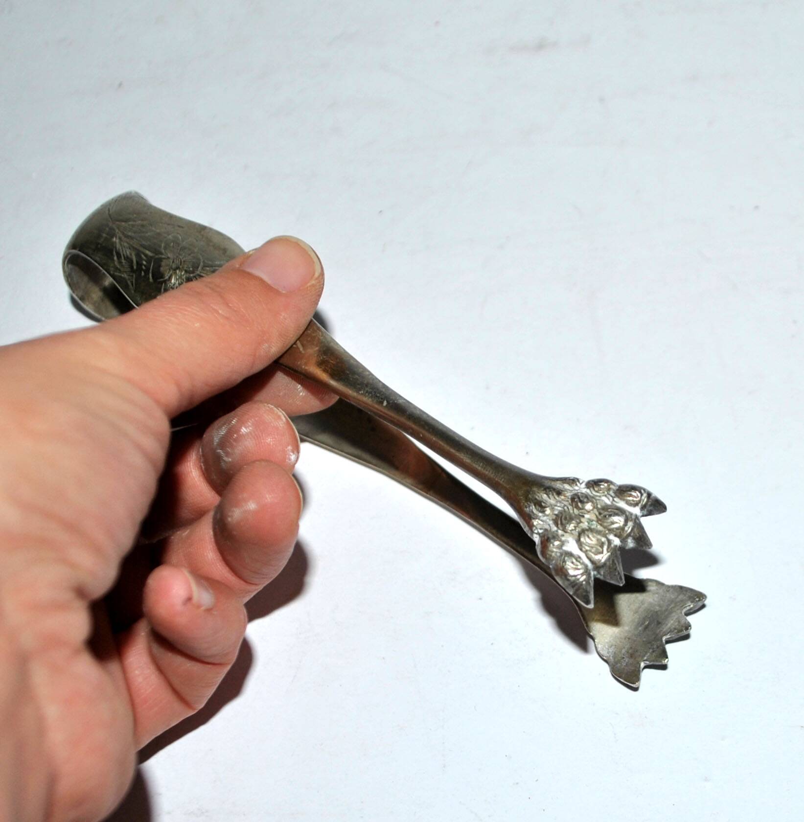 Vintage engraved silver metal lion claw sugar tongs