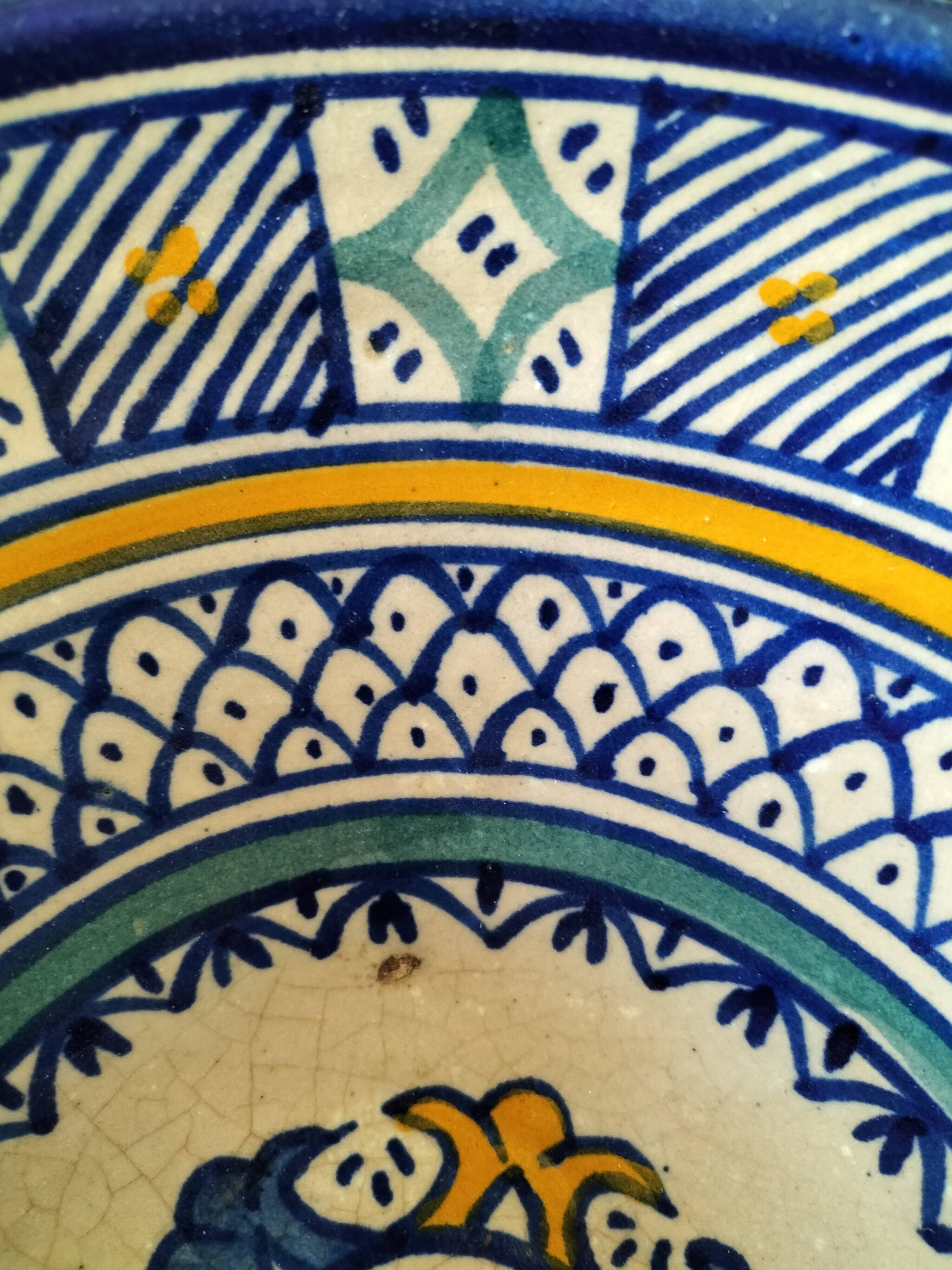 Set of 9 hand-painted Tunisian ceramics.
