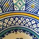 Set of 9 hand-painted Tunisian ceramics.