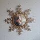 Vintage gold metal sun mirror