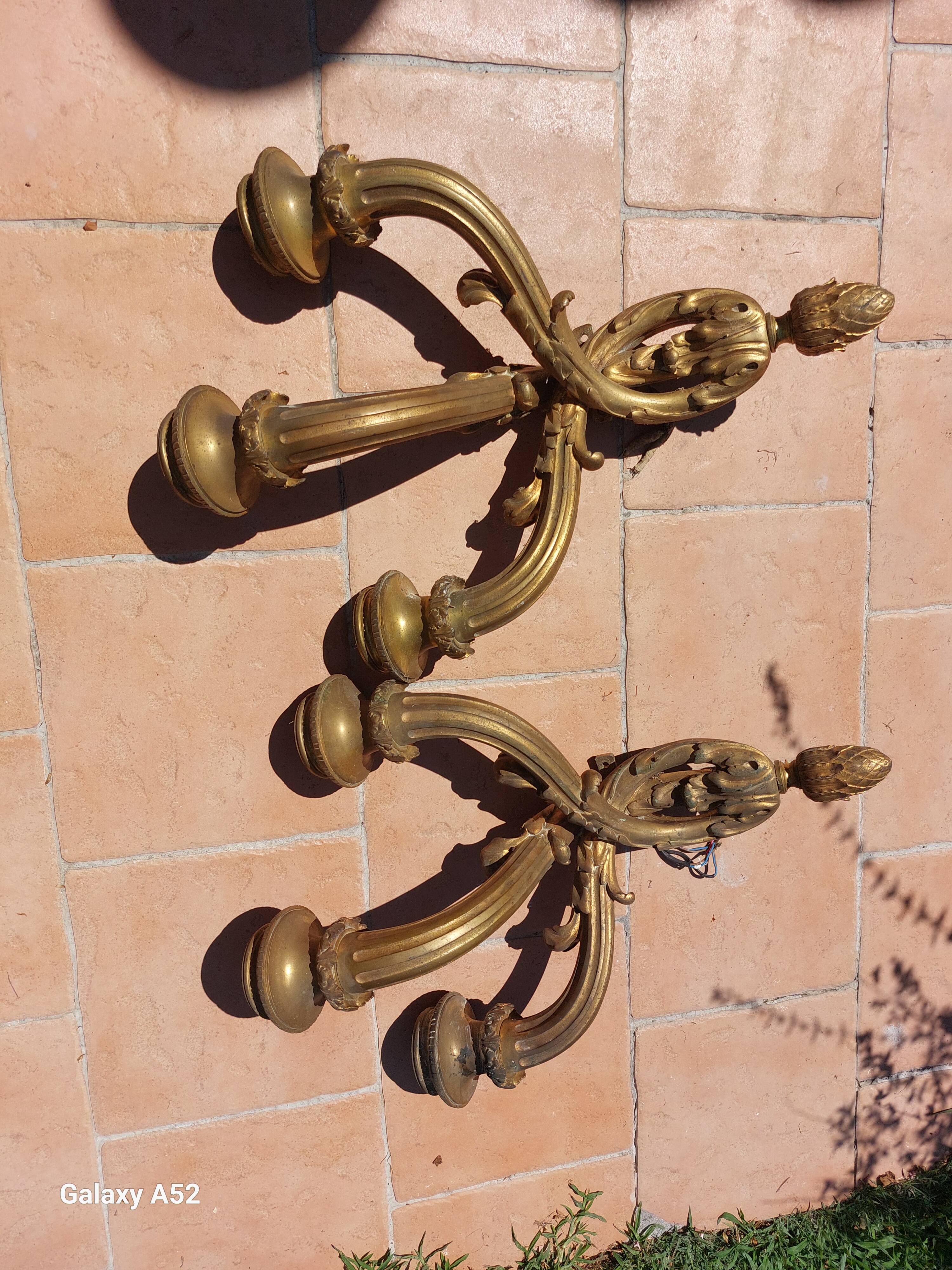 Pair of Louis XVI style wall sconces in bronze from the early 20th century, weighing 12 kg and 70 cm high.