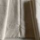 Linen cloth sheet embroidered with a pea festoon