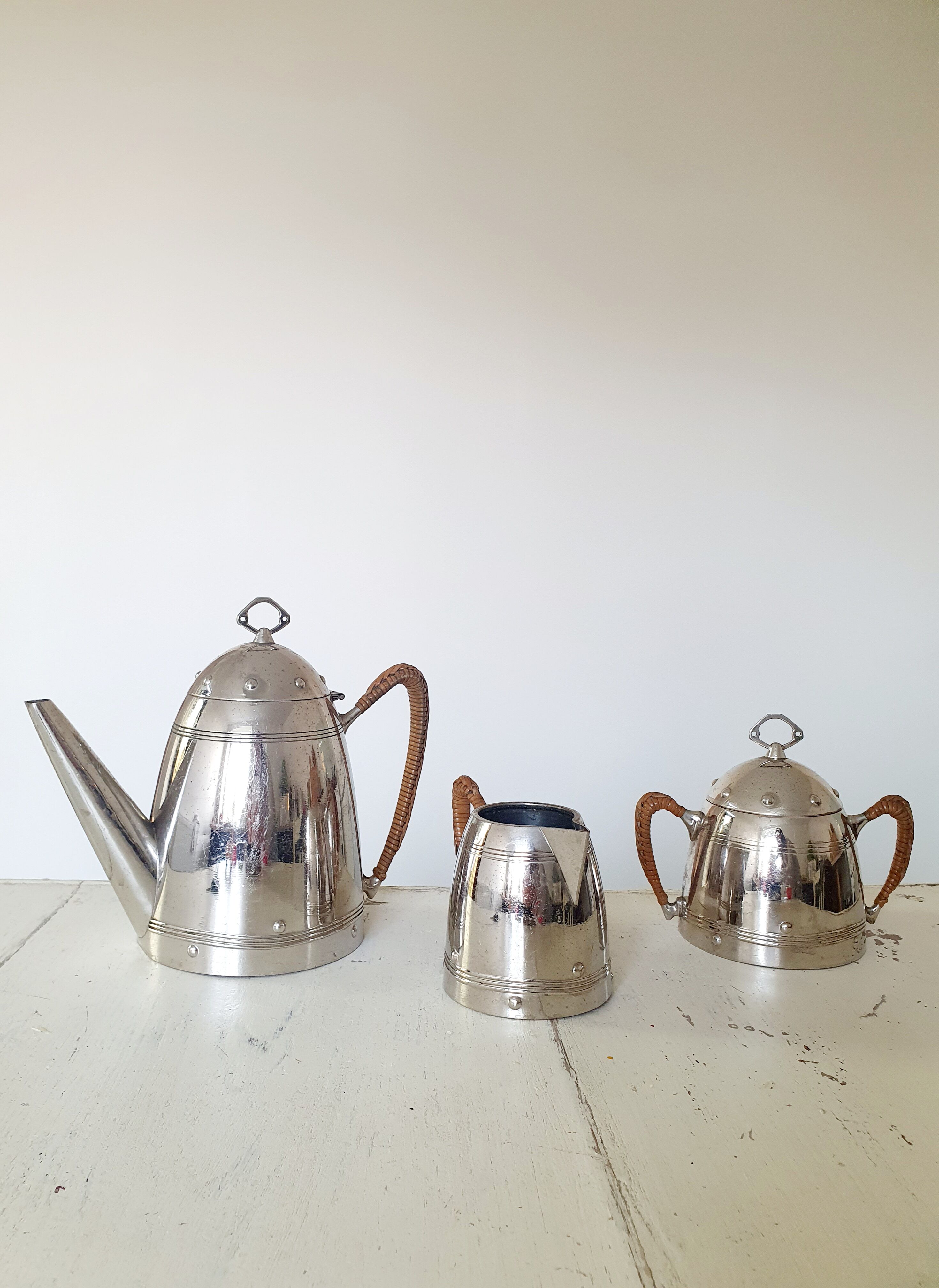 Coffee maker, milk pot and sugar bowl set
