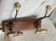 19th-century wall coat rack with 2 metal and horn hooks.
